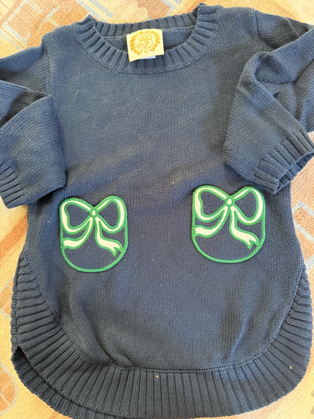 The Beaufort Bonnet Company Navy Sweater with Green Appliqué Bows